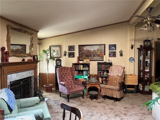 3 Concert Ln, Olmsted Twp, OH 44138 - carpeted living area with vaulted ceiling, ceiling fan, crown molding, and a fireplace