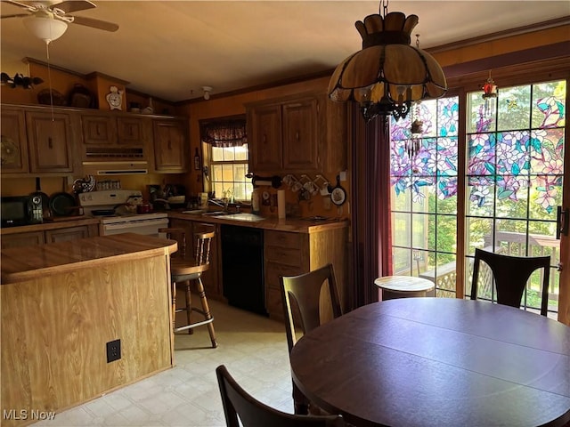 3 Concert Ln, Olmsted Twp, OH 44138 - kitchen with exhaust hood, black appliances, light flooring, a chandelier, and vaulted ceiling