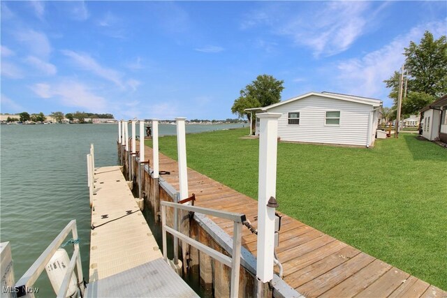 1660 N Compass Ave, Port Clinton, OH 43452 - dock with a water view and a lawn