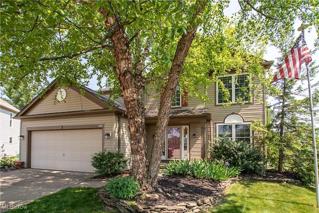 881 Brightwood Ct, Brunswick, OH 44212 - view of front facade with an attached garage and driveway