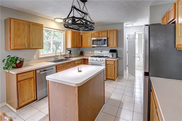 881 Brightwood Ct, Brunswick, OH 44212 - kitchen with stainless steel appliances, light tile patterned floors, light countertops, and a center island
