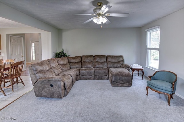 881 Brightwood Ct, Brunswick, OH 44212 - living area with ceiling fan and light colored carpet