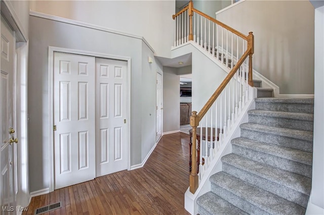 881 Brightwood Ct, Brunswick, OH 44212 - entryway featuring wood finished floors and stairs