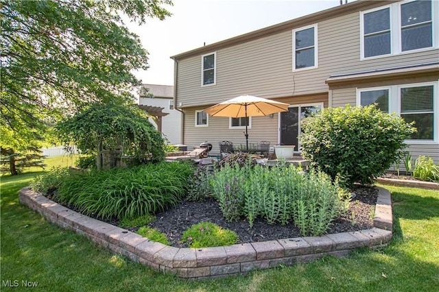 881 Brightwood Ct, Brunswick, OH 44212 - back of property featuring a yard and a pergola