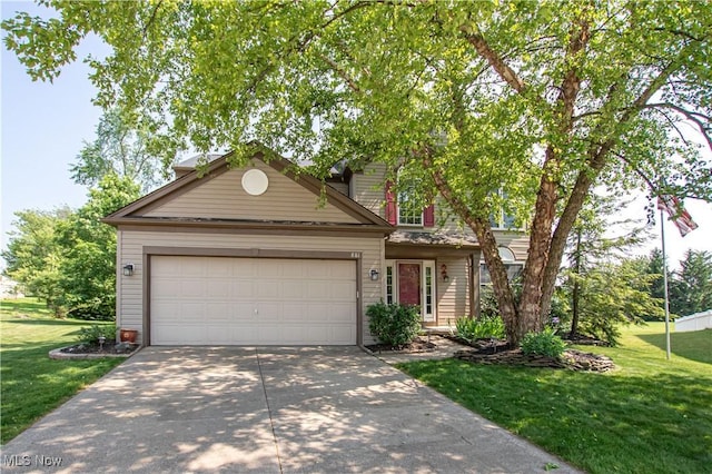 881 Brightwood Ct, Brunswick, OH 44212 - view of front of house featuring driveway, a front yard, and an attached garage