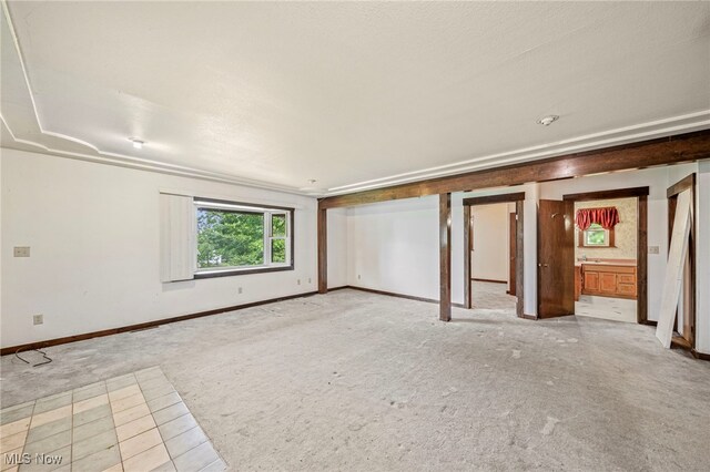 5769 Hurlburt Rd, Rome, OH 44085 - carpeted empty room with baseboards
