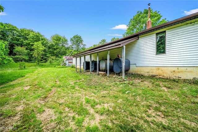 5769 Hurlburt Rd, Rome, OH 44085 - view of yard featuring heating fuel
