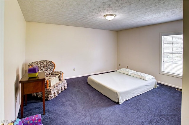 2121 Laurel Ln, Streetsboro, OH 44241 - bedroom featuring dark colored carpet and a textured ceiling