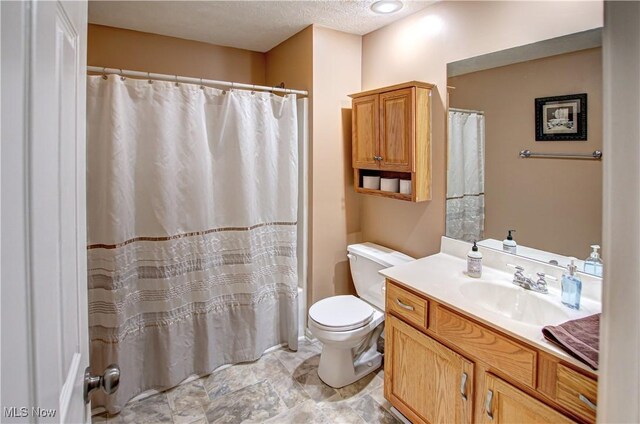 2121 Laurel Ln, Streetsboro, OH 44241 - bathroom with vanity, a textured ceiling, and curtained shower