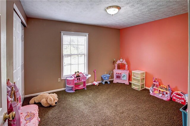 2121 Laurel Ln, Streetsboro, OH 44241 - game room with a textured ceiling and carpet flooring