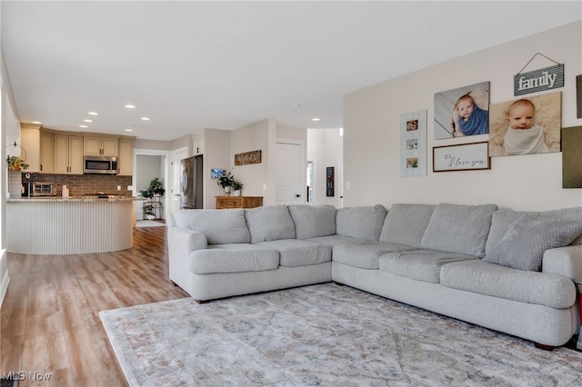 4532 Ridgestone Way, Medina, OH 44256 - living area featuring light wood-style flooring and recessed lighting