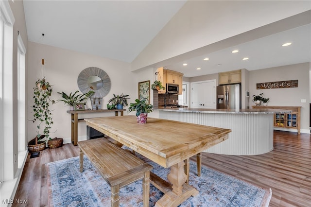 4532 Ridgestone Way, Medina, OH 44256 - dining area featuring wood finished floors, recessed lighting, and vaulted ceiling