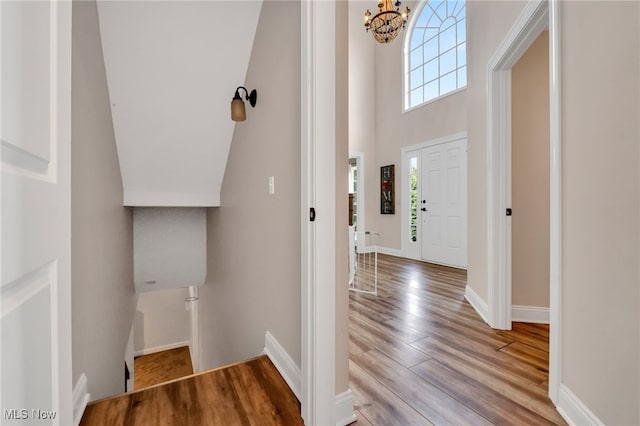4532 Ridgestone Way, Medina, OH 44256 - entryway with a chandelier, wood finished floors, and a towering ceiling