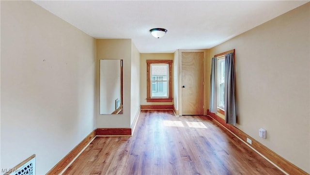 26 Walnut Ct, Mogadore, OH 44260 - unfurnished room featuring wood finished floors and baseboards