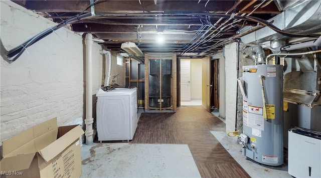 26 Walnut Ct, Mogadore, OH 44260 - unfinished basement featuring gas water heater and washer / clothes dryer