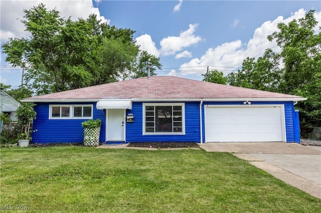 12604 Saint John Ave, Cleveland, OH 44111 - view of front of property with a front yard, driveway, and a garage
