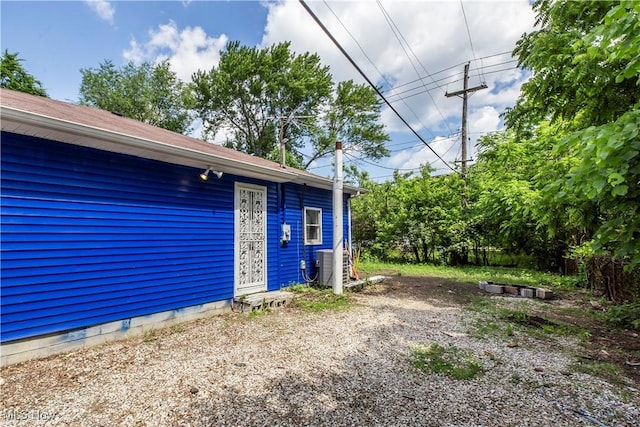 12604 Saint John Ave, Cleveland, OH 44111 - view of property exterior with a central AC unit