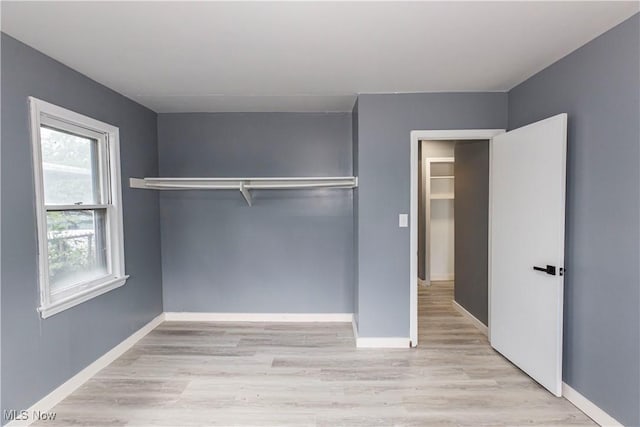 12604 Saint John Ave, Cleveland, OH 44111 - unfurnished bedroom with light wood finished floors and baseboards