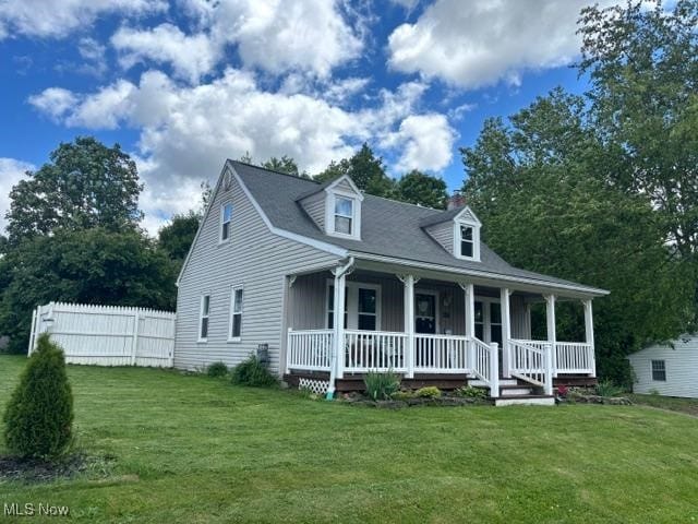 967 Lincoln St, Wooster, OH 44691 - view of front of home with a porch and a chimney