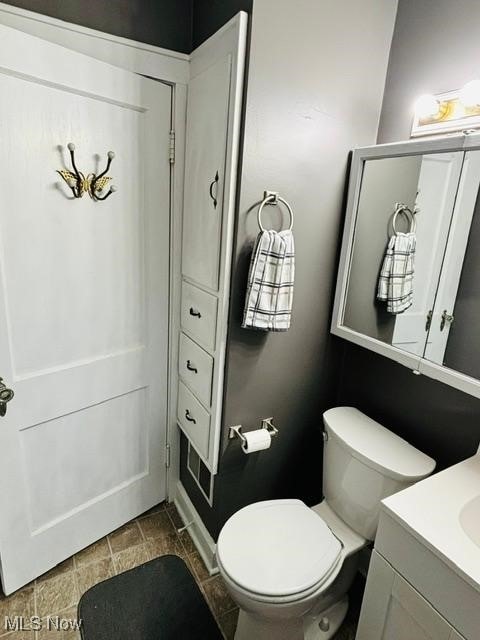 967 Lincoln St, Wooster, OH 44691 - bathroom featuring vanity and toilet