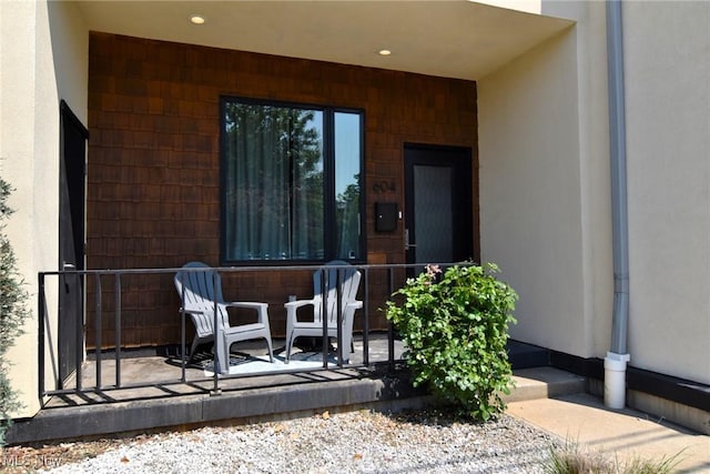 604 Marquardt Ave, Cleveland, OH 44113 - view of exterior entry featuring stucco siding