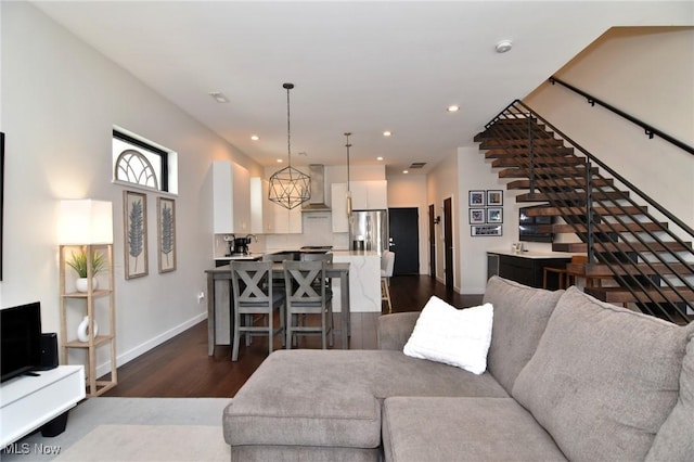 604 Marquardt Ave, Cleveland, OH 44113 - living area featuring dark wood-style flooring, recessed lighting, and stairs