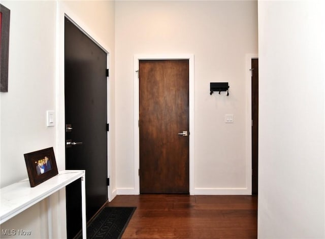 604 Marquardt Ave, Cleveland, OH 44113 - entryway with dark wood-type flooring and baseboards