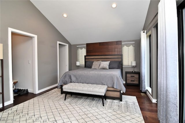 604 Marquardt Ave, Cleveland, OH 44113 - bedroom with vaulted ceiling, multiple windows, dark wood-type flooring, and recessed lighting