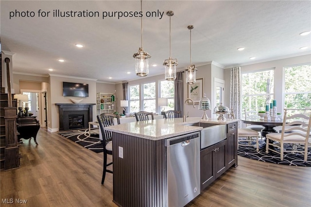 3344 White Willow Ln, Brunswick, OH 44212 - kitchen with stainless steel dishwasher, crown molding, dark wood-type flooring, recessed lighting, and a kitchen island with sink