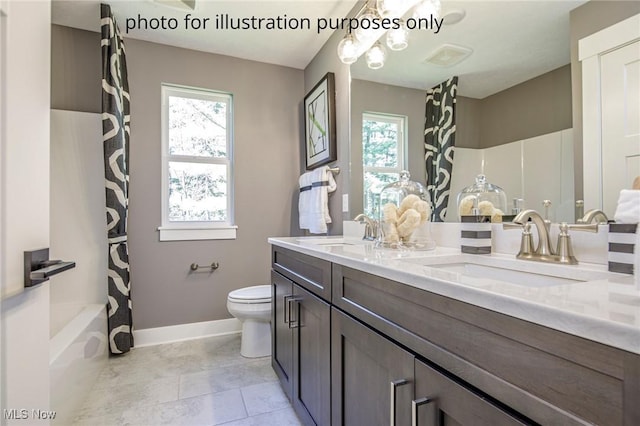 3344 White Willow Ln, Brunswick, OH 44212 - bathroom with double vanity, healthy amount of natural light, shower / tub combo with curtain, and a chandelier