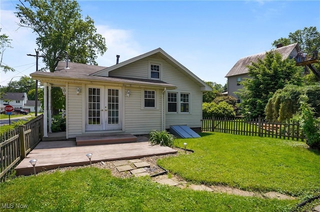 608 S 14th St, Sebring, OH 44672 - back of property featuring french doors and a wooden deck
