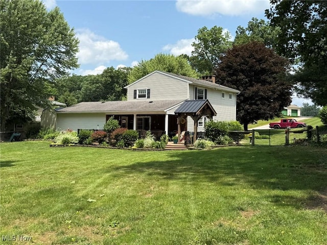 22399 Township Rd Unit 1203, West Lafayette, OH 43845 - traditional-style home featuring a chimney