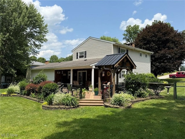 22399 Township Rd Unit 1203, West Lafayette, OH 43845 - back of property featuring a chimney and a wooden deck