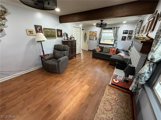 22399 Township Rd Unit 1203, West Lafayette, OH 43845 - living room featuring wood finished floors, crown molding, beam ceiling, and recessed lighting