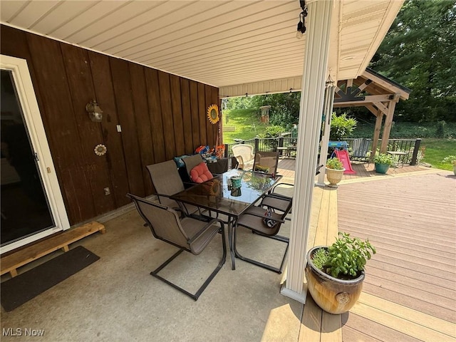 22399 Township Rd Unit 1203, West Lafayette, OH 43845 - view of patio / terrace featuring outdoor dining space and a deck
