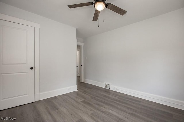 381 Watson St, Akron, OH 44305 - unfurnished bedroom with wood finished floors and ceiling fan