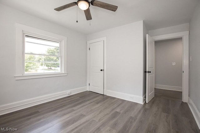 381 Watson St, Akron, OH 44305 - unfurnished bedroom with wood finished floors and ceiling fan