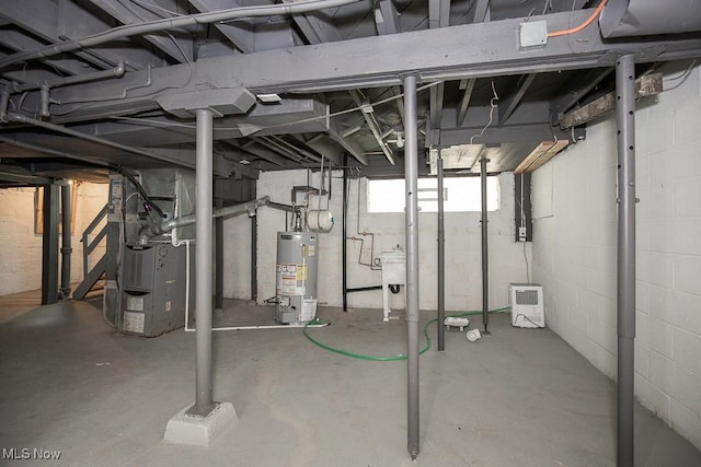 381 Watson St, Akron, OH 44305 - basement with gas water heater and heating unit