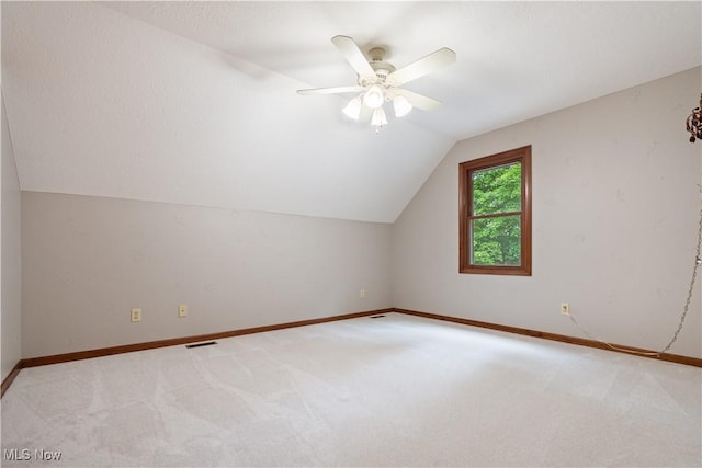1588 Eagle Watch St NE, Canton, OH 44721 - additional living space featuring carpet, lofted ceiling, and a ceiling fan