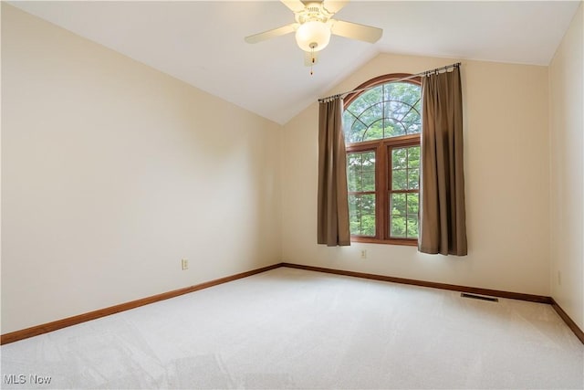 1588 Eagle Watch St NE, Canton, OH 44721 - unfurnished room featuring light carpet, vaulted ceiling, and ceiling fan