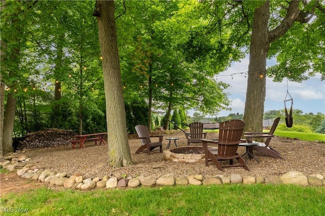 1588 Eagle Watch St NE, Canton, OH 44721 - view of yard featuring an outdoor fire pit
