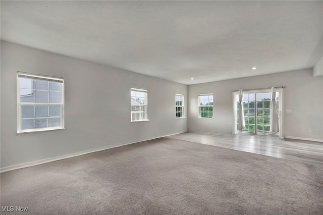 1633 Duncan Way, Streetsboro, OH 44241 - empty room with carpet flooring and recessed lighting