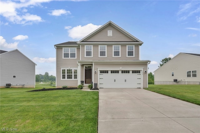 1633 Duncan Way, Streetsboro, OH 44241 - traditional-style home featuring a front yard, concrete driveway, and an attached garage