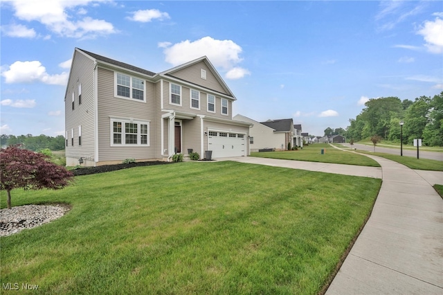 1633 Duncan Way, Streetsboro, OH 44241 - view of front of house featuring an attached garage, concrete driveway, and a front yard