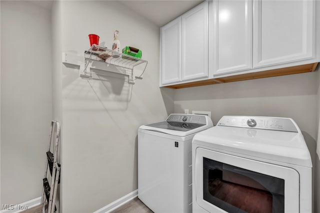 1633 Duncan Way, Streetsboro, OH 44241 - washroom with separate washer and dryer and cabinet space