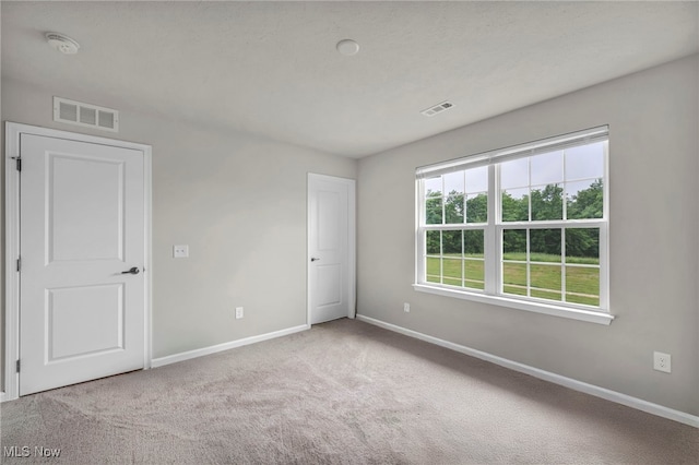 1633 Duncan Way, Streetsboro, OH 44241 - unfurnished bedroom with baseboards and carpet floors