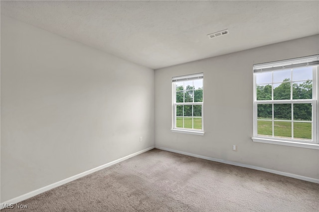 1633 Duncan Way, Streetsboro, OH 44241 - spare room featuring baseboards and carpet floors