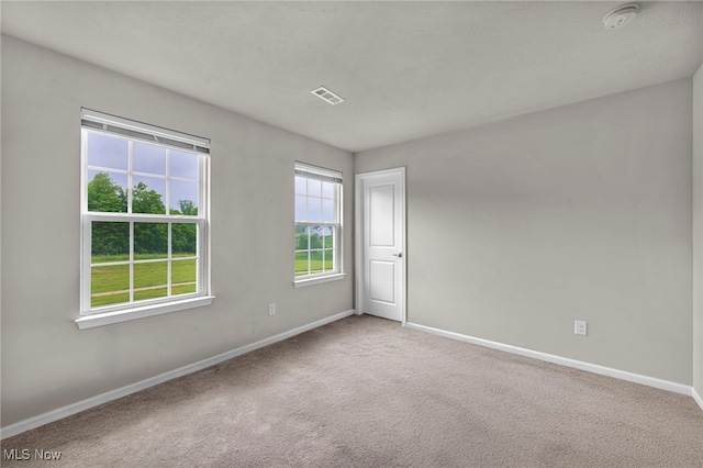 1633 Duncan Way, Streetsboro, OH 44241 - carpeted spare room with a smoke detector and baseboards