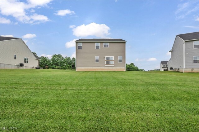 1633 Duncan Way, Streetsboro, OH 44241 - rear view of house with a lawn