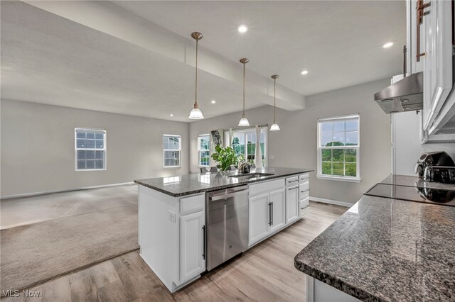 1633 Duncan Way, Streetsboro, OH 44241 - kitchen with stainless steel dishwasher, wall chimney exhaust hood, white cabinets, light wood-type flooring, and a kitchen island with sink